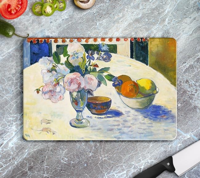 Flowers and a Bowl of Fruit on a Table